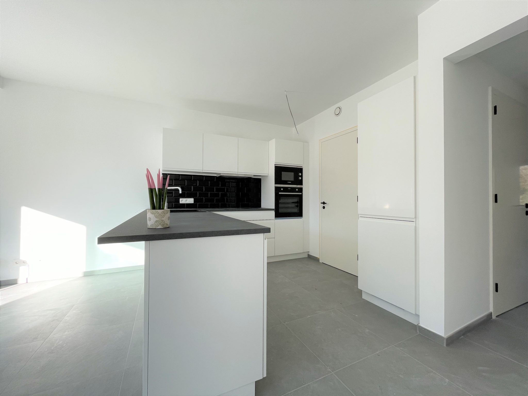 Nieuwbouwappartement-te-huur-haasdonk-beveren-twee-slaapkamers-autostaanplaats