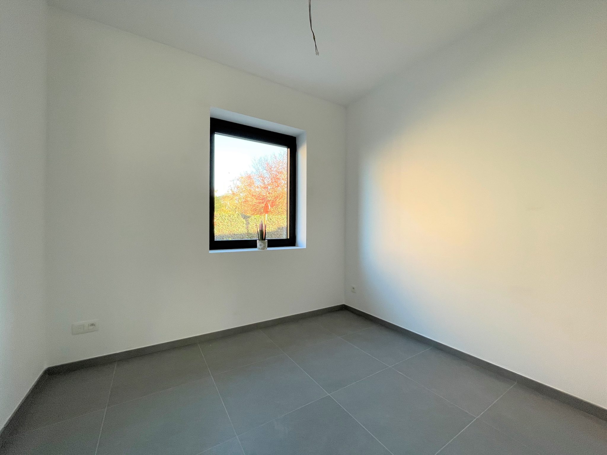 Nieuwbouwappartement-te-huur-haasdonk-beveren-twee-slaapkamers-autostaanplaats